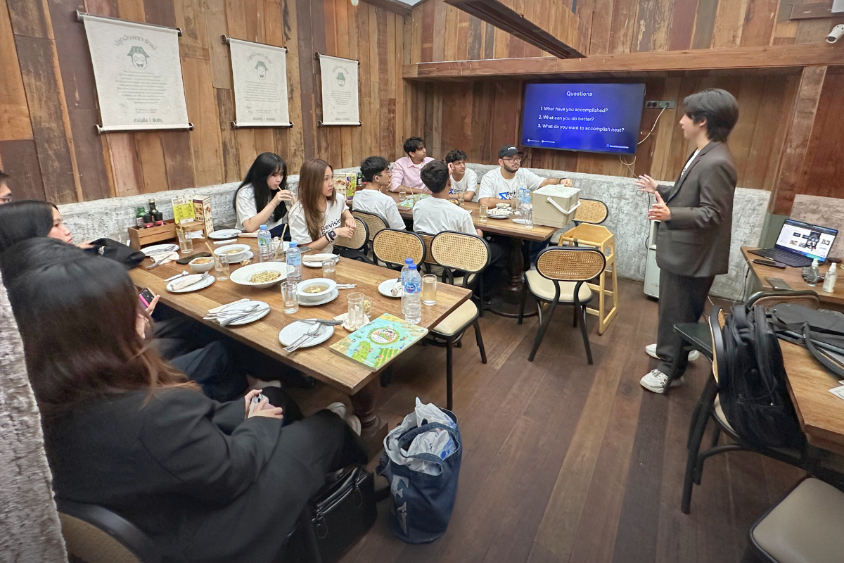 Phuwadit Sutthaporn, Co-Founder & COO, speaking during the RevIntern 2.0 welcome dinner