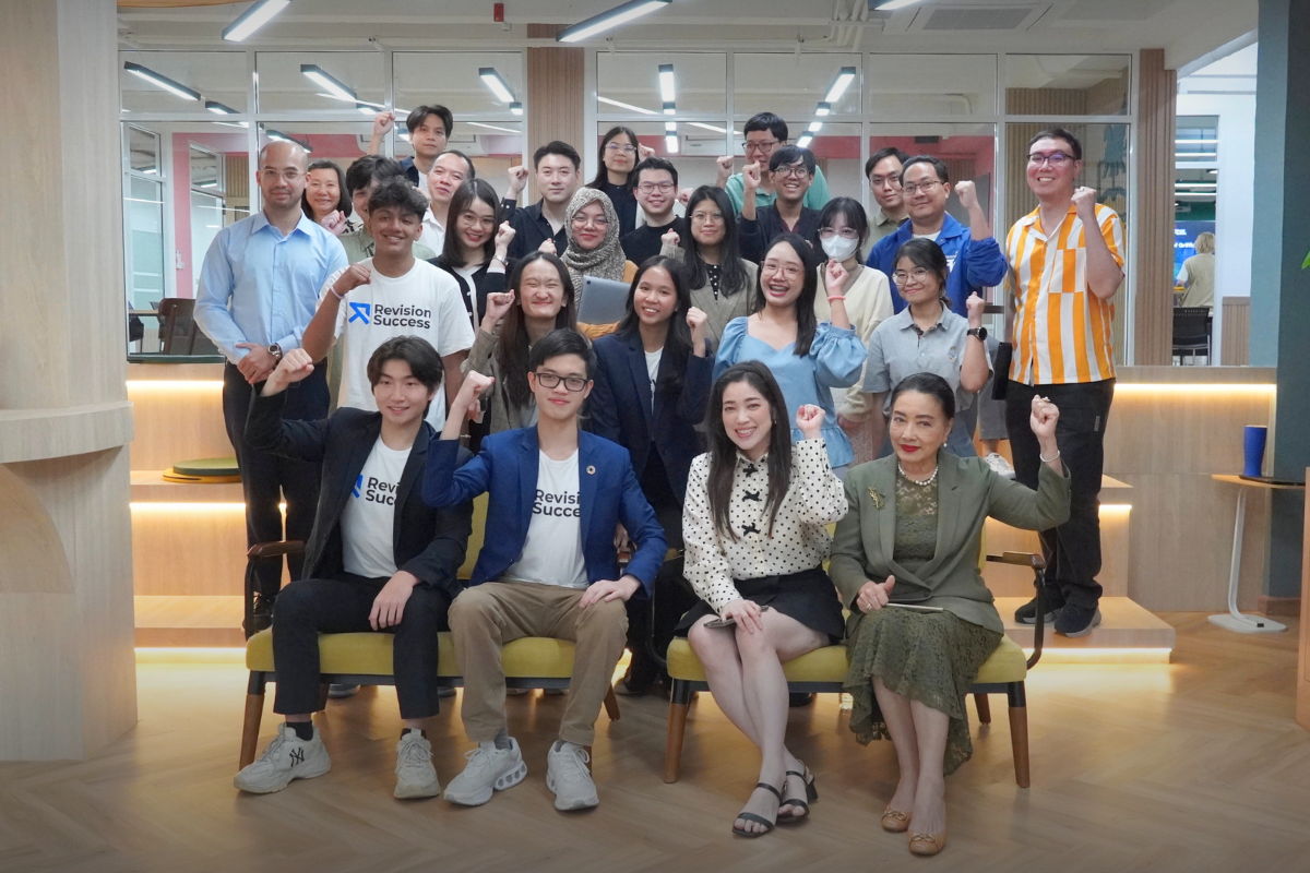 Group photo of the RevisionSuccess team and attendees, including executives and teachers at House of Griffin